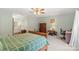 Bedroom featuring a bed and furniture, complemented by a view into the en-suite bathroom at 119 Mary Louise Ct, Fort Mill, SC 29715