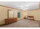 Bedroom with a mirror, dresser, and neutral decor at 119 Mary Louise Ct, Fort Mill, SC 29715