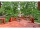 Inviting wooden deck overlooking lush greenery, perfect for outdoor relaxation at 119 Mary Louise Ct, Fort Mill, SC 29715