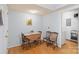 Cozy dining area next to the kitchen with hardwood floors and view into the laundry room at 119 Mary Louise Ct, Fort Mill, SC 29715
