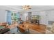 Comfortable living room with hardwood floors and a large window provides natural light at 119 Mary Louise Ct, Fort Mill, SC 29715