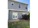 Backyard view featuring a patio and double doors with view of some grass at 12120 Stratfield Place Cir, Pineville, NC 28134