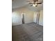 Bright primary bedroom features plush carpeting, neutral walls, and a vaulted ceiling at 12120 Stratfield Place Cir, Pineville, NC 28134