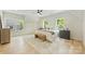 Serene primary bedroom with a plush bed, neutral decor, ample natural light, and a cozy, inviting atmosphere at 205 Coxe Ave, Charlotte, NC 28208