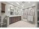 Spa-like bathroom with a double vanity, a glass enclosed shower, and ample space at 208 Wendover Heights Cir, Charlotte, NC 28211