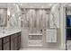 Contemporary bathroom features a double shower with glass enclosure and modern fixtures at 208 Wendover Heights Cir, Charlotte, NC 28211
