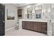 Elegant bathroom features double vanity, modern fixtures, and large mirrors at 208 Wendover Heights Cir, Charlotte, NC 28211