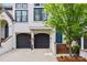 Beautiful home featuring a private garage, a front door, and a manicured lawn at 208 Wendover Heights Cir, Charlotte, NC 28211
