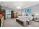 Bright main bedroom with a king bed, neutral colors, and stylish furnishings at 208 Wendover Heights Cir, Charlotte, NC 28211