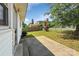 View of backyard with a shed and a brick building in the distance at 209 S Ransom St, Gastonia, NC 28052
