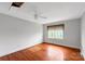 Comfortable bedroom featuring hardwood floors and a window, providing natural light and a cozy ambiance at 209 S Ransom St, Gastonia, NC 28052