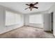 Bedroom with carpet, ceiling fan, and natural light at 209 S Ransom St, Gastonia, NC 28052