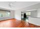 Spacious living room with hardwood floors and views into the bright kitchen, perfect for entertaining at 209 S Ransom St, Gastonia, NC 28052