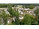 Aerial view of a neighborhood highlighting the layout and landscaping of a residential community at 2535 Andes Dr, Statesville, NC 28625