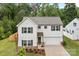 Charming two-story home with a well-maintained lawn, complemented by a two car garage and classic facade at 2535 Andes Dr, Statesville, NC 28625