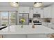 Bright kitchen featuring white cabinets, stainless steel appliances, and a center island at 2535 Andes Dr, Statesville, NC 28625