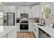 Bright kitchen featuring stainless steel appliances and white countertops at 2535 Andes Dr, Statesville, NC 28625