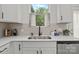 Kitchen featuring a stainless steel sink, ample counter space, and modern fixtures at 2535 Andes Dr, Statesville, NC 28625
