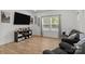 View of the living room featuring modern décor and hardwood floors at 2535 Andes Dr, Statesville, NC 28625