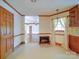 Kitchen with wood cabinets and wood trimmed entrance at 2721 Tara Dr, Monroe, NC 28112
