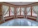 Sunlit room features large windows and light tile flooring at 2721 Tara Dr, Monroe, NC 28112