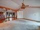 Spacious living room, featuring ceiling fan and a doorway entrance to kitchen and living room at 2721 Tara Dr, Monroe, NC 28112