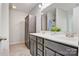 Bathroom featuring double sink vanity, hardwood cabinet, mirror and cabinet for storage at 2835 24Th Street Ne Dr, Hickory, NC 28601