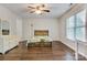 Bright bedroom with wood-look flooring, ceiling fan, natural light and unique wood headboard at 2835 24Th Street Ne Dr, Hickory, NC 28601