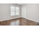 Bright bedroom with wood-look flooring, natural light and closet at 2835 24Th Street Ne Dr, Hickory, NC 28601
