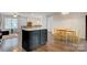 Open concept dining area with hardwood floors and a view into the living room at 2835 24Th Street Ne Dr, Hickory, NC 28601