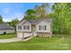 Well-maintained home featuring an attached two-car garage, set back from the road on a sprawling lawn at 2835 24Th Street Ne Dr, Hickory, NC 28601