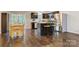Modern kitchen with stainless steel appliances, dark cabinets, and a breakfast bar at 2835 24Th Street Ne Dr, Hickory, NC 28601