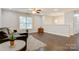Bright living room with hardwood floors, a comfortable couch, and a large window at 2835 24Th Street Ne Dr, Hickory, NC 28601