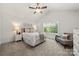 Calm bedroom with natural light, vaulted ceiling, a neutral color palette, and plush carpet at 3205 Morning Dr, Charlotte, NC 28208
