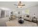 A spacious living space with an open layout connecting the living and dining areas at 3205 Morning Dr, Charlotte, NC 28208