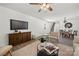 A spacious living area provides easy access to the stairs and dining room at 3205 Morning Dr, Charlotte, NC 28208