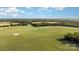 Expansive aerial view of the property showcasing rolling fields and green landscape, perfect for outdoor activities at 328 Earl Griffin Rd, Monroe, NC 28112