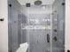 Elegant shower showcasing navy blue herringbone tile and recessed niche shelf at 328 Earl Griffin Rd, Monroe, NC 28112