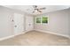 Neutral bedroom with large closet space and natural light at 328 Earl Griffin Rd, Monroe, NC 28112