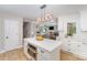 View of the kitchen which features an island and is open to the living room at 328 Earl Griffin Rd, Monroe, NC 28112