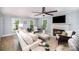 Cozy living room with natural light, featuring a fireplace and comfortable seating for relaxing at 328 Earl Griffin Rd, Monroe, NC 28112