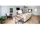 Inviting living room featuring a cozy fireplace and bright windows, with plenty of space for relaxation at 328 Earl Griffin Rd, Monroe, NC 28112