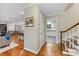 Hallway with view into kitchen and living room at 3329 Winnipeg Cir, Charlotte, NC 28210