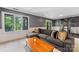 Spacious living room with ample seating and natural light from large windows at 3329 Winnipeg Cir, Charlotte, NC 28210