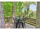 Charming outdoor dining area surrounded by trees, perfect for enjoying meals in nature at 3329 Winnipeg Cir, Charlotte, NC 28210
