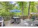 Outdoor patio featuring a table with chairs and a grill at 3329 Winnipeg Cir, Charlotte, NC 28210