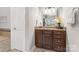 Bathroom features a dark vanity with granite countertop and mosaic tile at 3398 Millstone Creek Rd, Lancaster, SC 29720