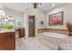 Bright bathroom boasts a soaking tub, tile shower, and vanity with granite countertop at 3398 Millstone Creek Rd, Lancaster, SC 29720
