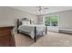 Bright bedroom with iron bed frame, window seat, and ample natural light at 3398 Millstone Creek Rd, Lancaster, SC 29720