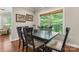 Comfortable dining space with a wooden table, six chairs, and natural light at 3398 Millstone Creek Rd, Lancaster, SC 29720